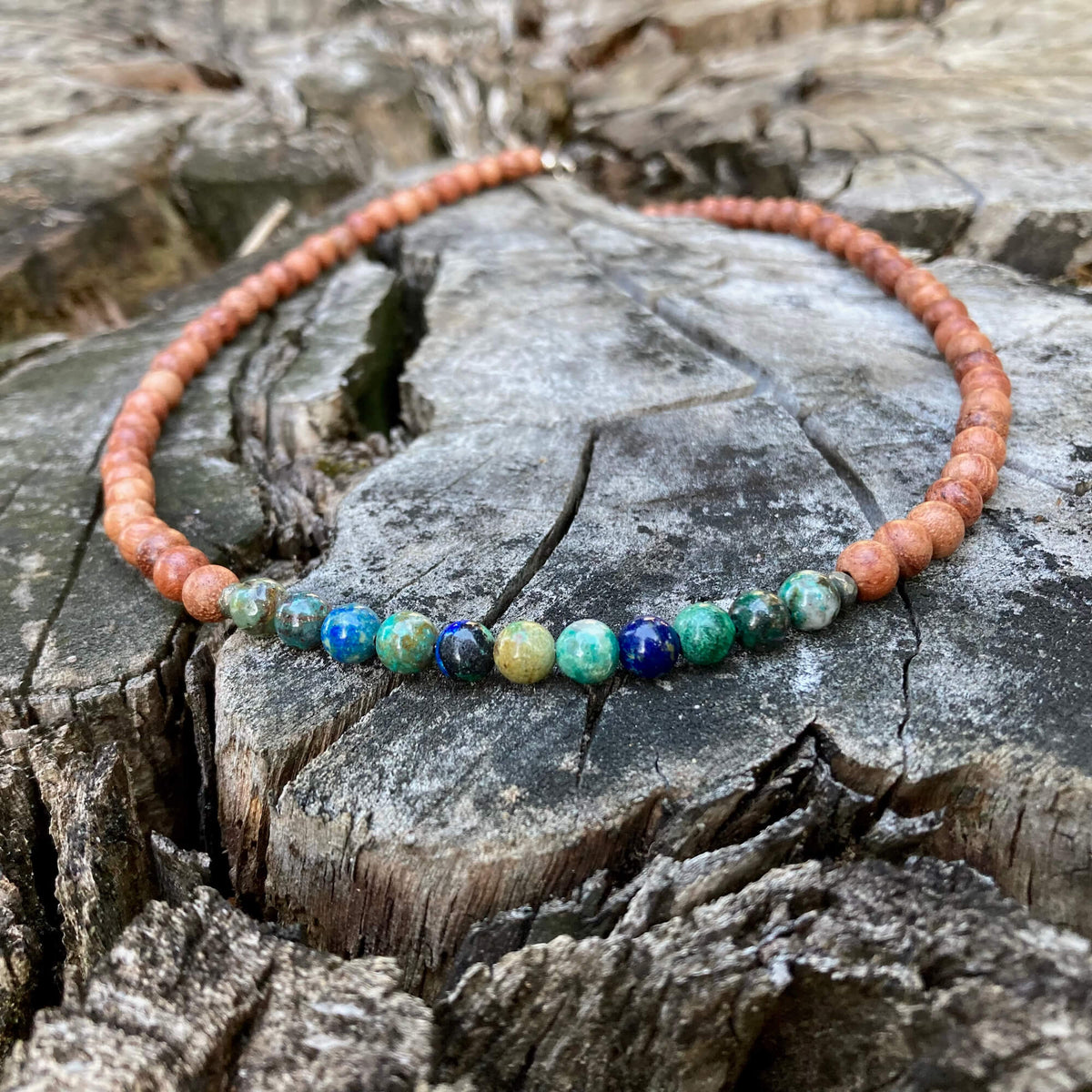 Close-up of blue and green azurite beads on the Inner Wisdom necklace