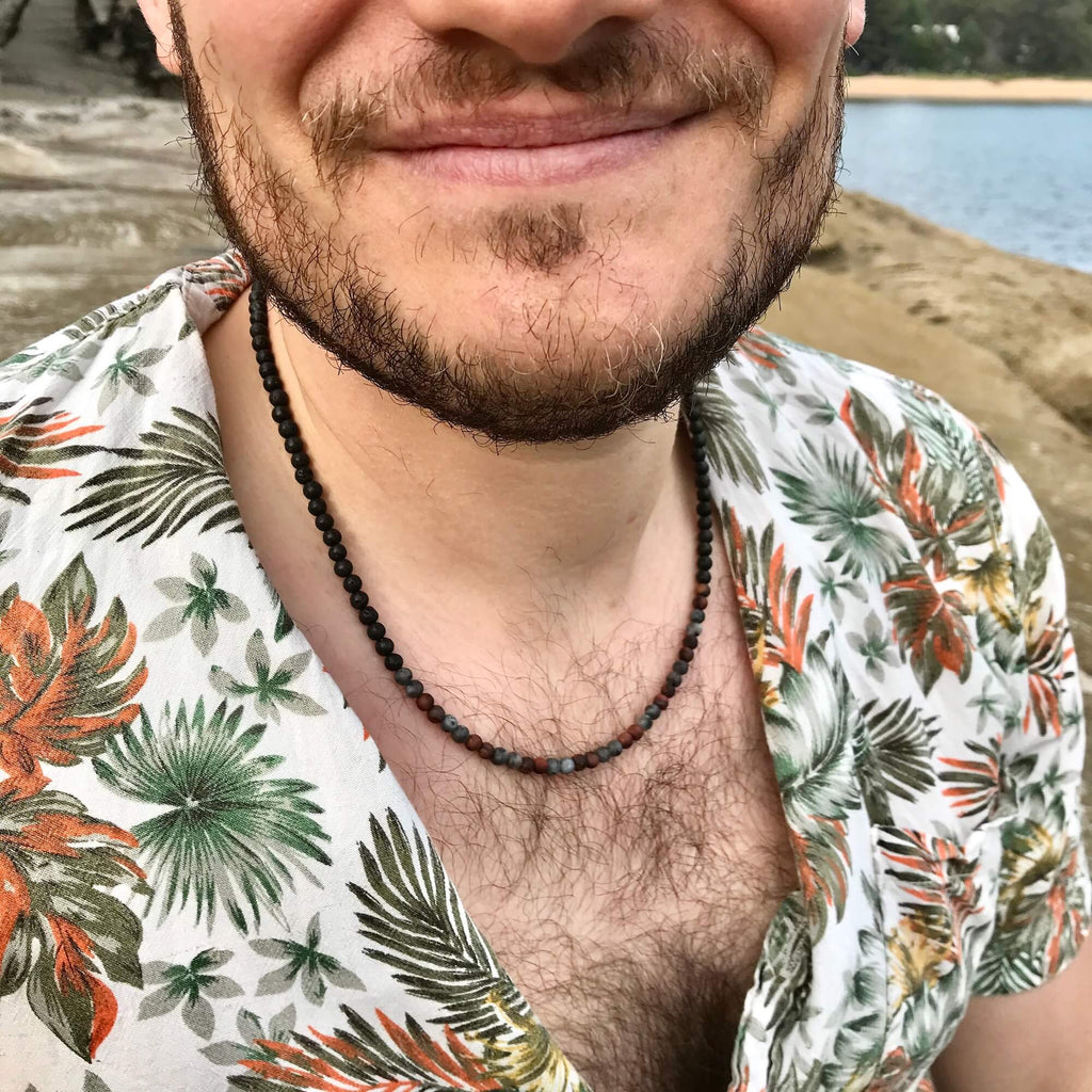 Close-up of the Drive necklace worn at the collarbone