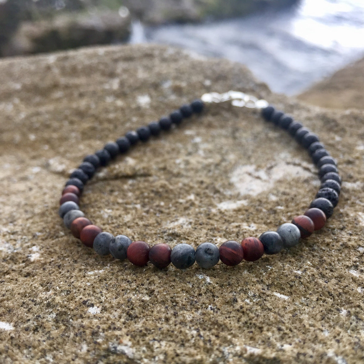 Drive bracelet on sandstone, sterling silver clasp at the back