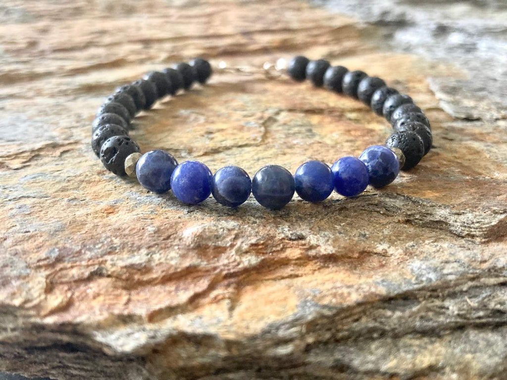 Focus bracelet on weathered sandstone in soft light