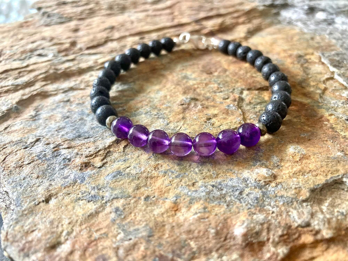 Zen bracelet from above on sandstone, sterling silver clasp at the top